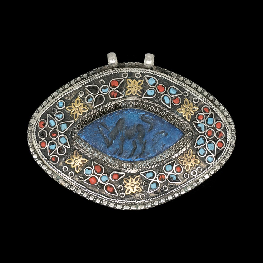 Vintage Turkmen pendant with imprint of an antelope
