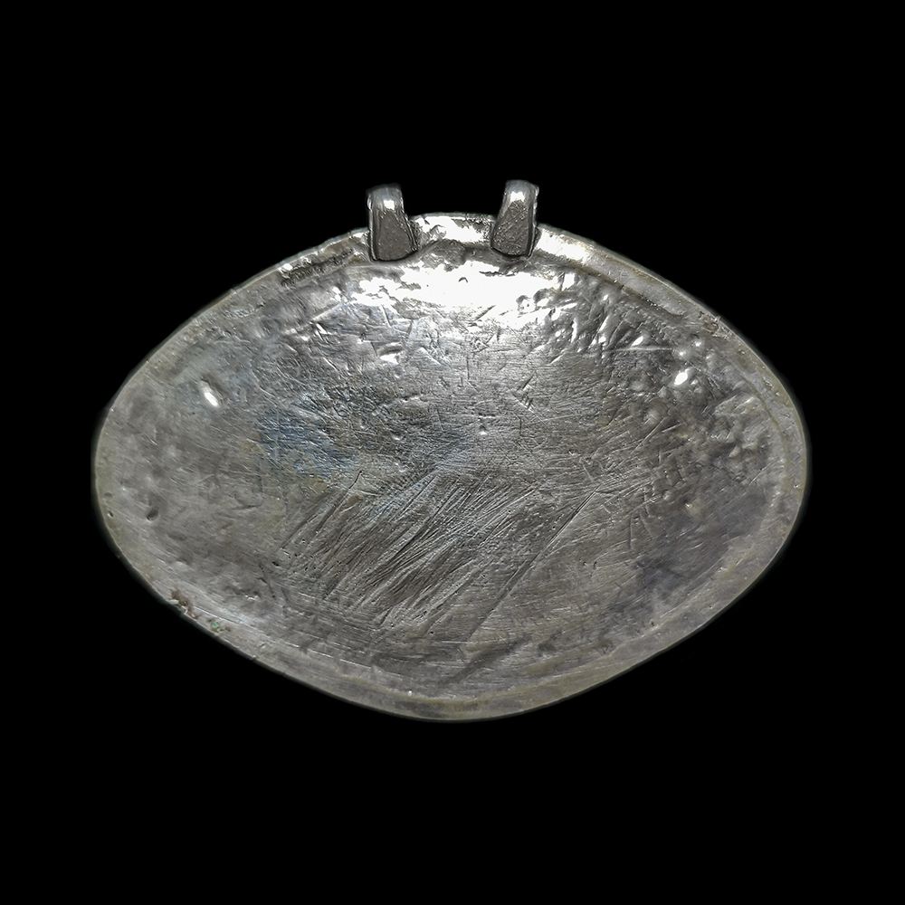 Vintage Turkmen pendant with imprint of an antelope